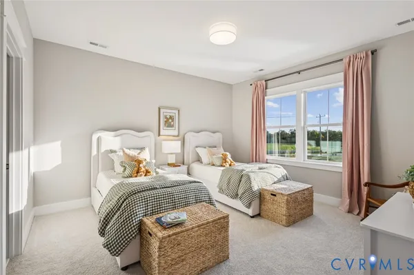 a bedroom with bed and a large window