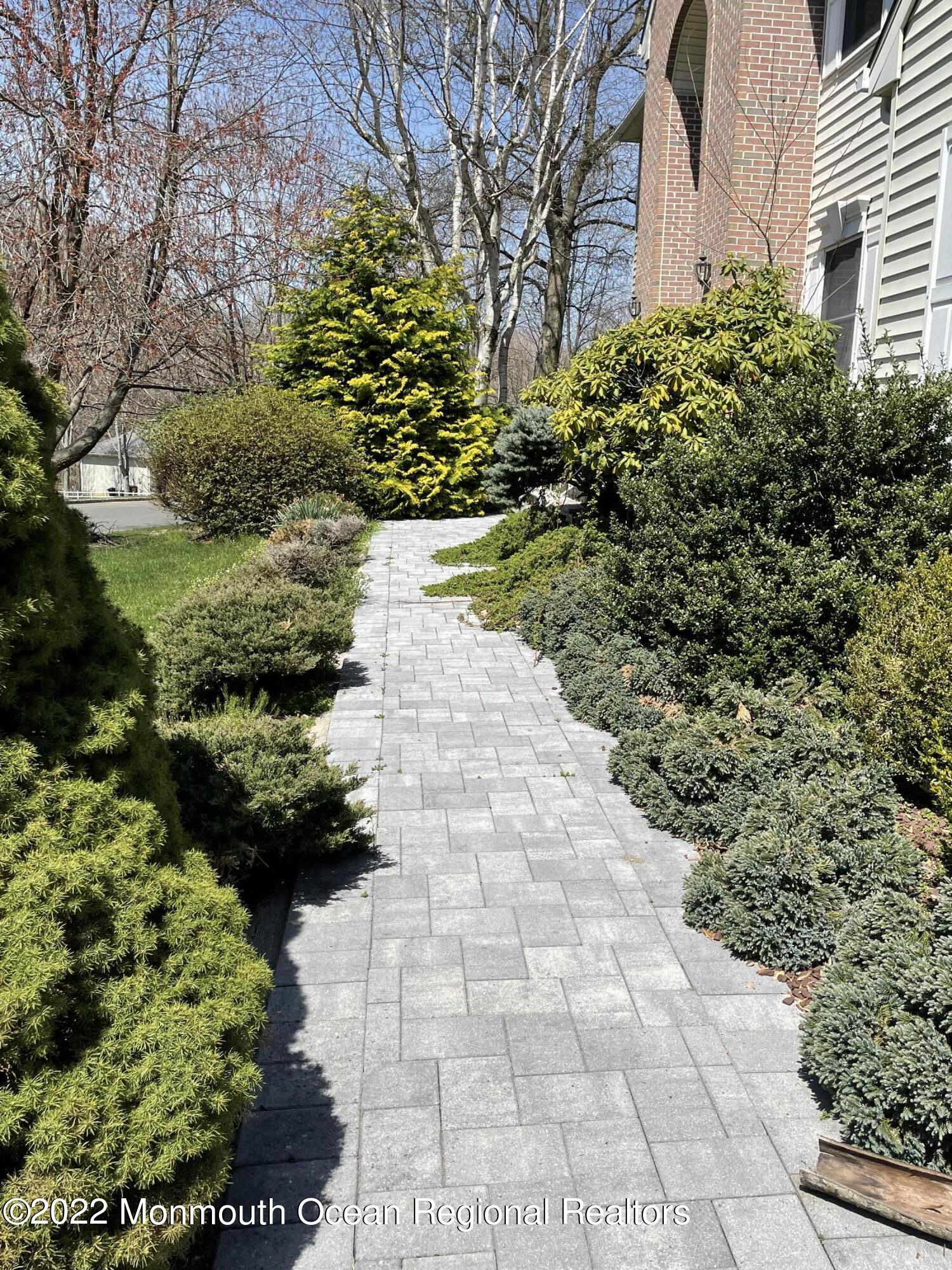243 Nottingham Road Morganville, NJ 07751 - Photo 3 of 24 Paver path to entry