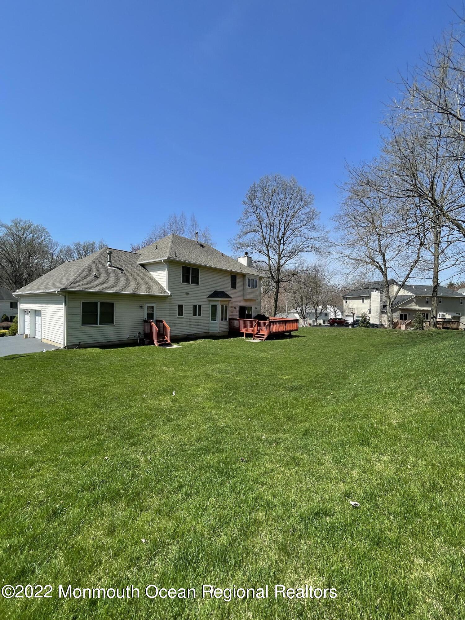 243 Nottingham Road Morganville, NJ 07751 - Photo 4 of 24 Spacious backyard