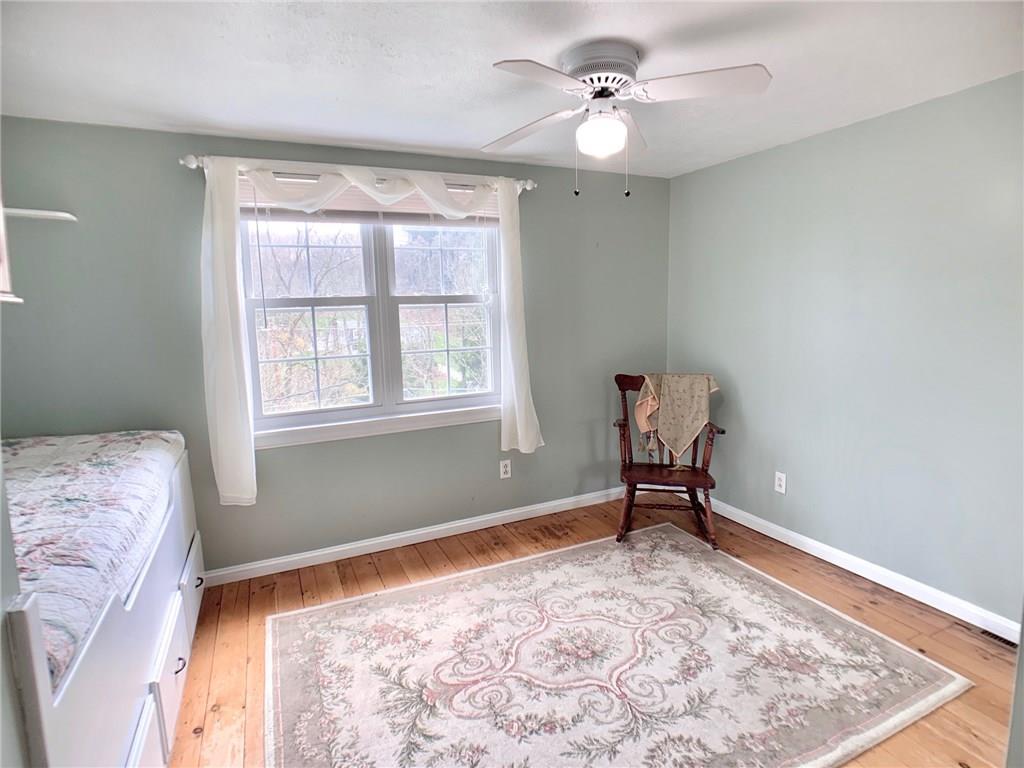 119 Union Church Road Mars, PA 16046 - Photo 12 of 25 2nd bedroom with built in twin bed with storage, original 1870's hardwood flooring