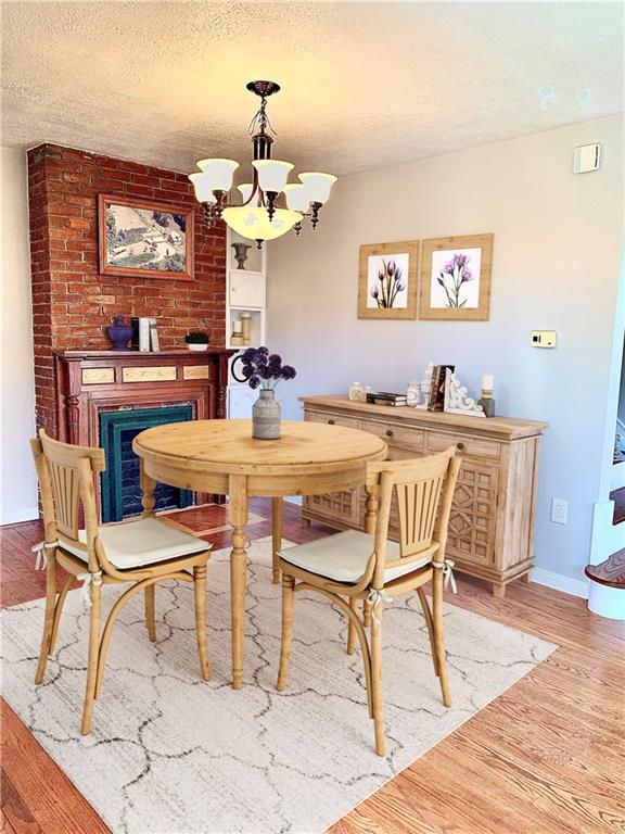 119 Union Church Road Mars, PA 16046 - Photo 4 of 25 Flexible dining space with lovingly restored, original fireplace.