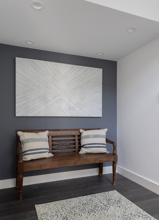 2 Adrian Street, Unit FRONT Somerville, MA 02143 - Photo 11 of 17 a sitting area with wooden benches
