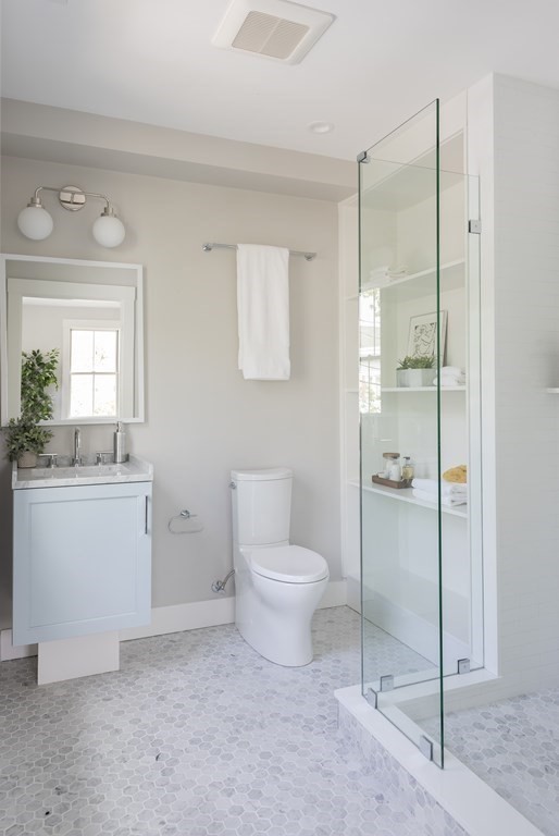 2 Adrian Street, Unit FRONT Somerville, MA 02143 - Photo 10 of 17 a bathroom with a toilet sink and shower