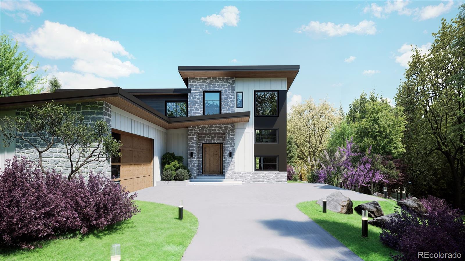 a front view of a house with a yard and trees