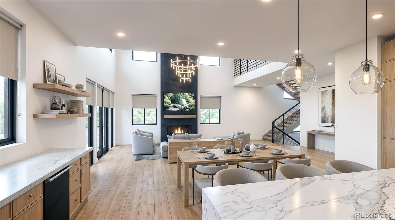 4389 North Carr Street Wheat Ridge, CO 80033 - Photo 3 of 11 a living room with furniture kitchen view and a wooden floor