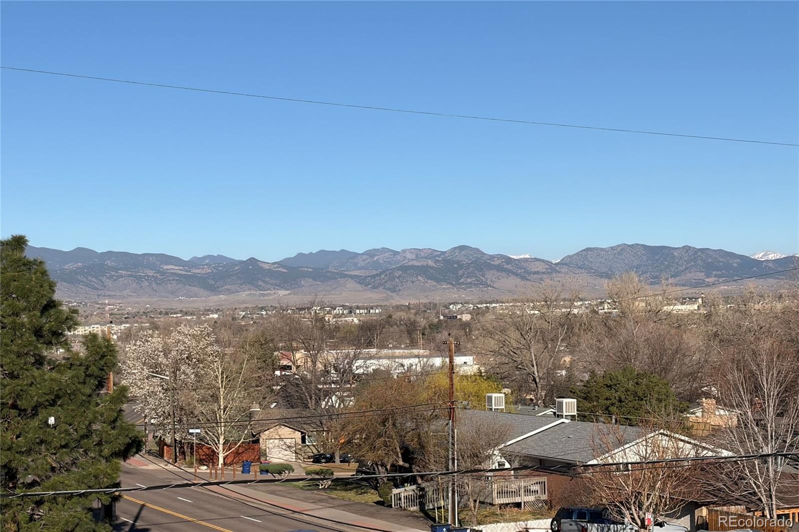 4389 North Carr Street Wheat Ridge, CO 80033 - Photo 6 of 11 a view of city and mountain
