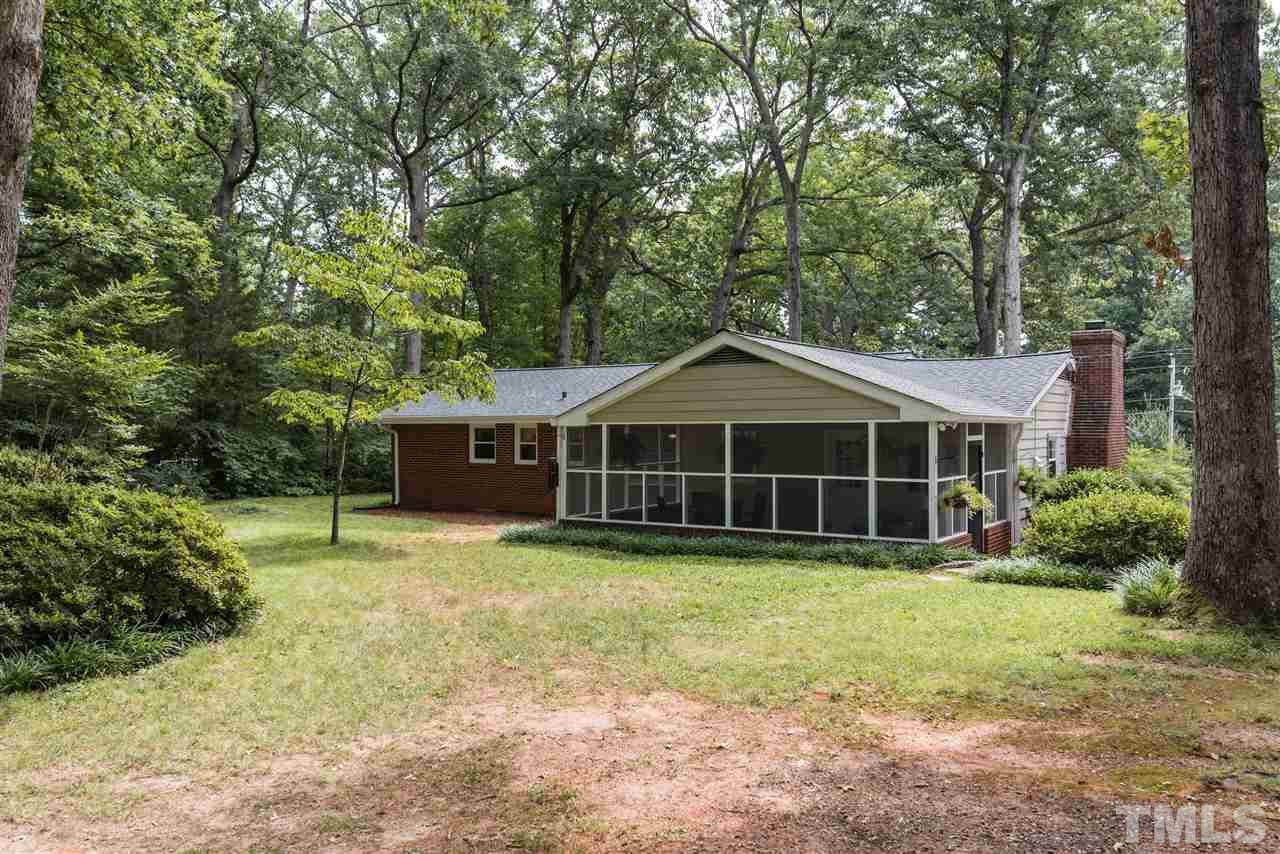 6405 Johnsdale Road Raleigh, NC 27615 - Photo 21 of 25 a view of a house with yard and sitting area