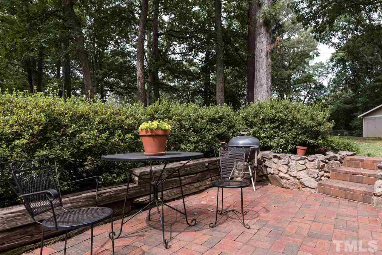 6405 Johnsdale Road Raleigh, NC 27615 - Photo 23 of 25 a view of a chairs and table in the patio