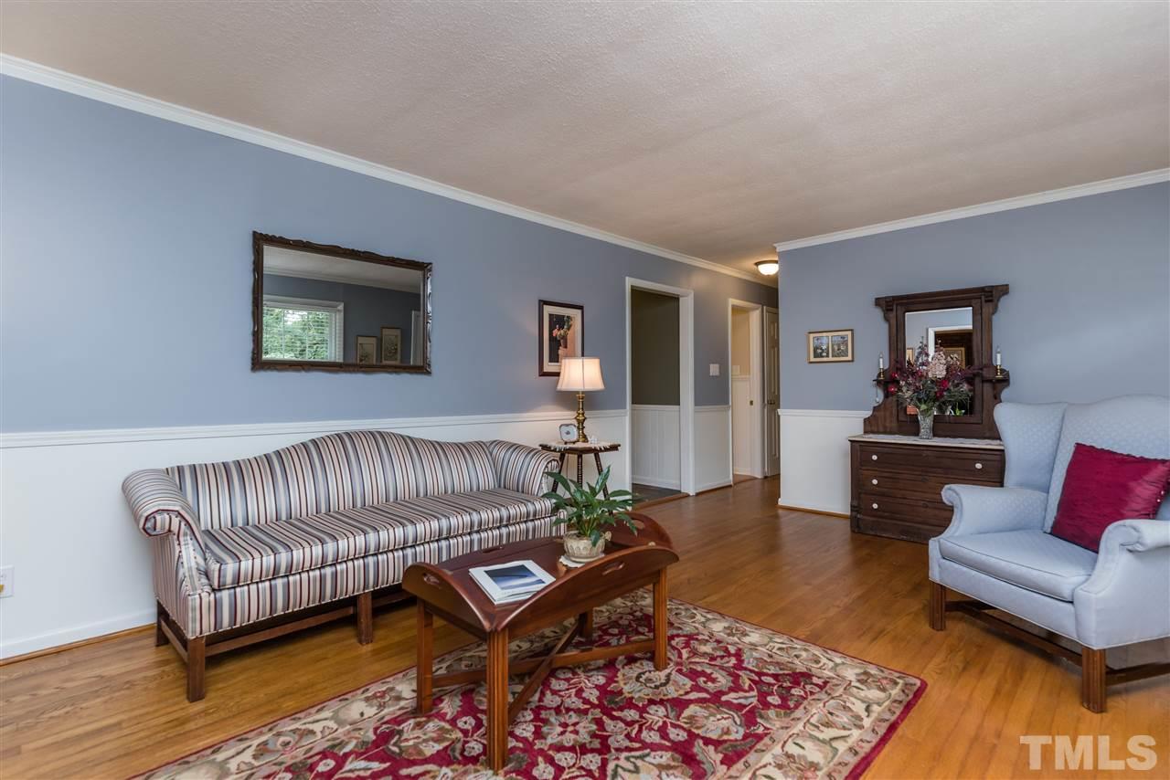 6405 Johnsdale Road Raleigh, NC 27615 - Photo 4 of 25 a living room with furniture rug and window