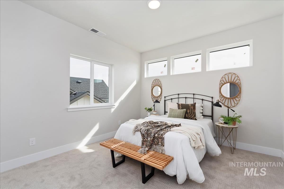 2829 West Warlander Street Meridian, ID 83642 - Photo 27 of 32 Carpeted bedroom featuring baseboards