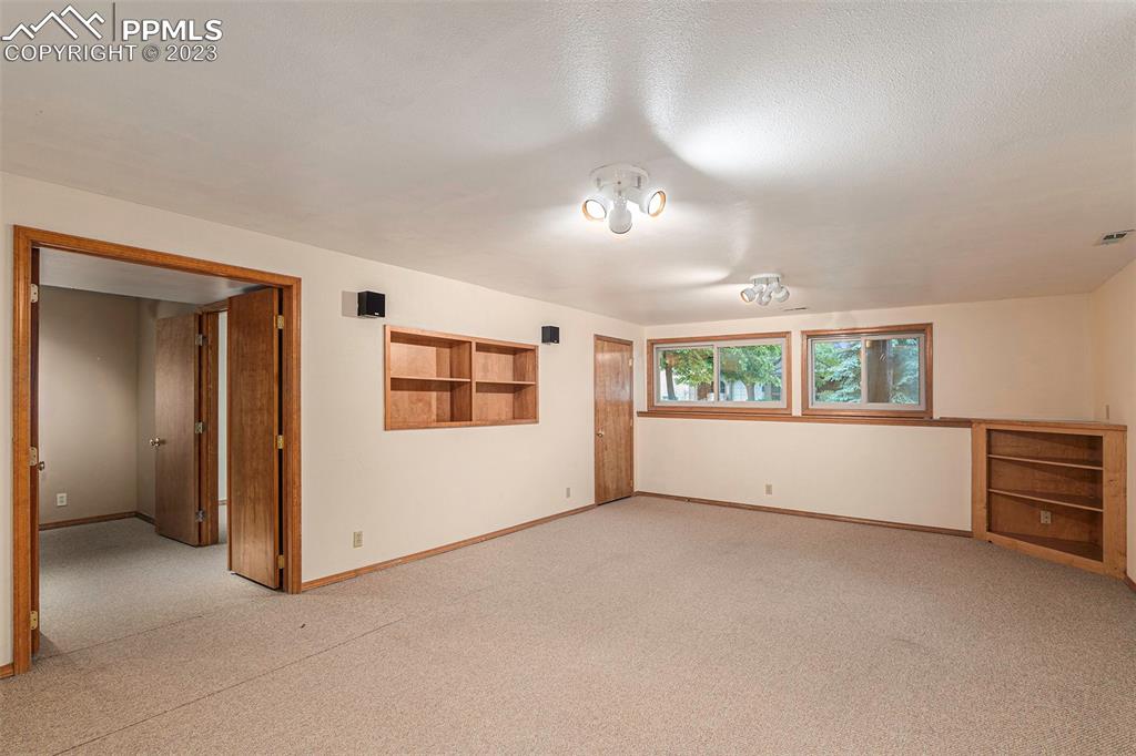 9054 Estebury Circle Colorado Springs, CO 80920 - Photo 16 of 26 a view of an empty room with a window