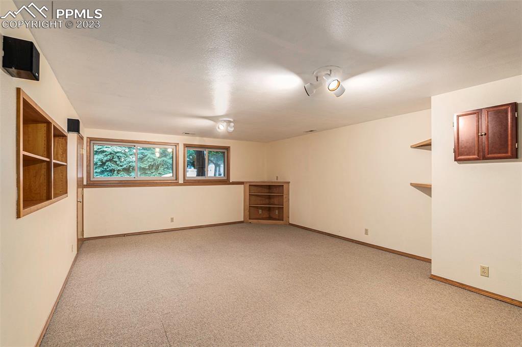 9054 Estebury Circle Colorado Springs, CO 80920 - Photo 17 of 26 a view of an empty room with a window