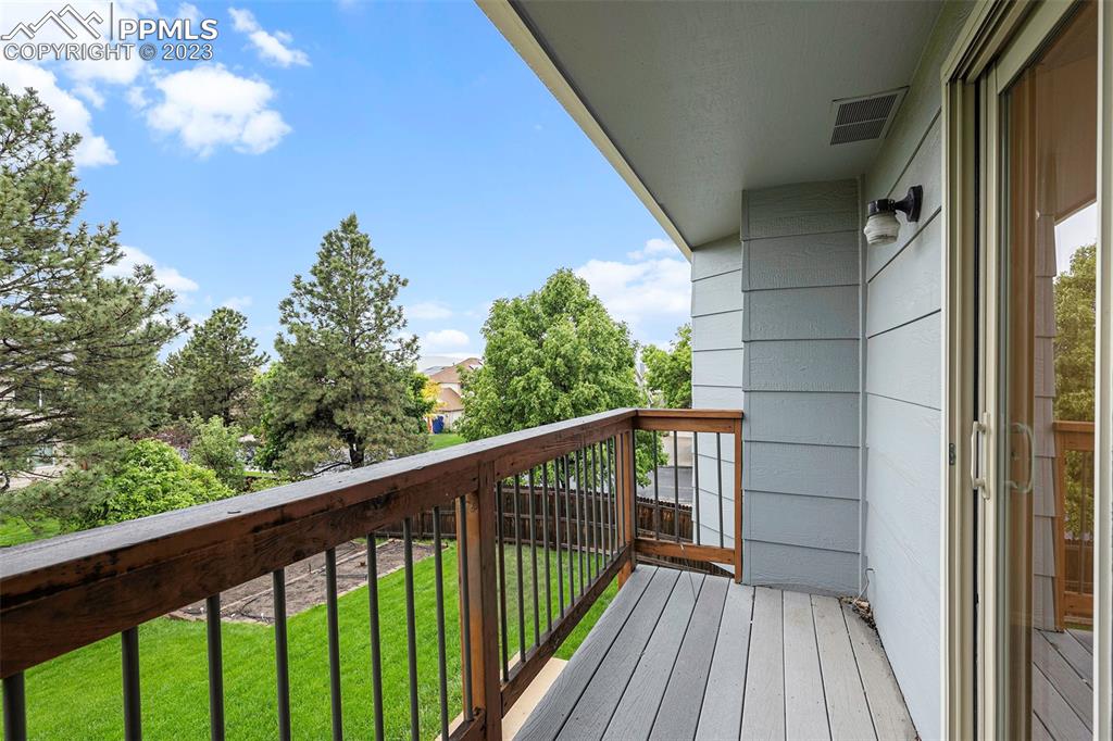 9054 Estebury Circle Colorado Springs, CO 80920 - Photo 23 of 26 a view of balcony with wooden floor
