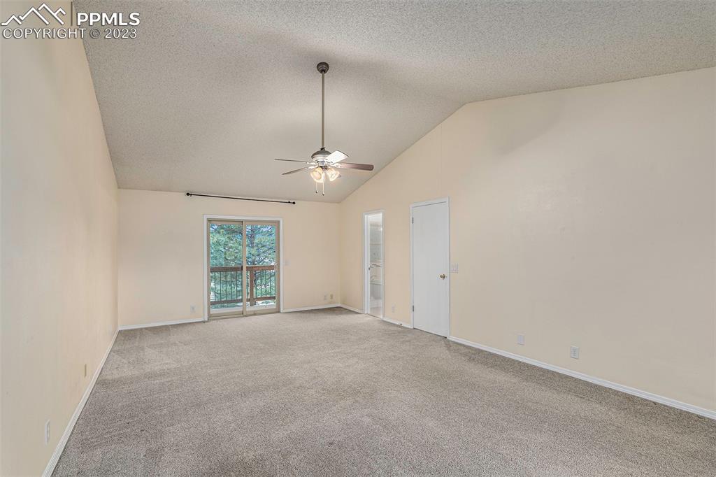 9054 Estebury Circle Colorado Springs, CO 80920 - Photo 9 of 26 a view of an empty room with a window