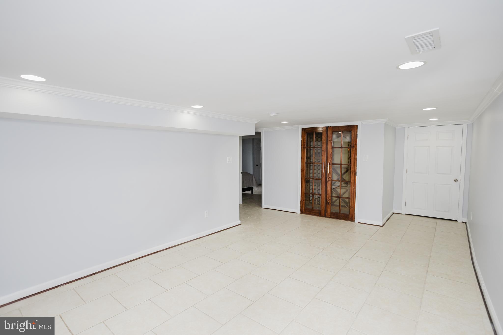 2177 Chain Bridge Road Vienna, VA 22182 - Photo 42 of 48 a view of an empty room with closet and entryway