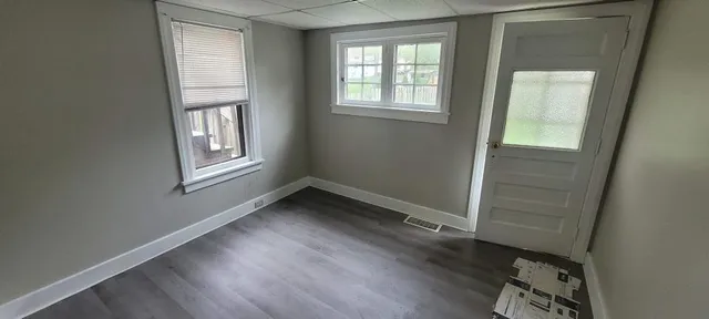 an empty room with windows