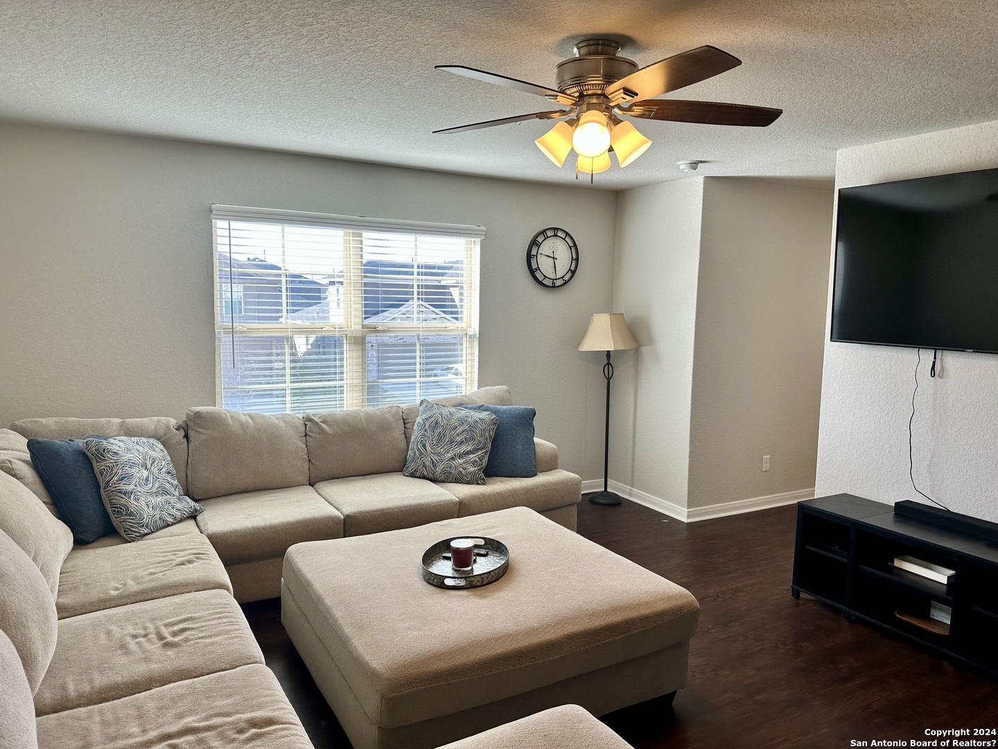 8907 Portobello Converse, TX 78109 - Photo 14 of 26 a living room with furniture and a flat screen tv