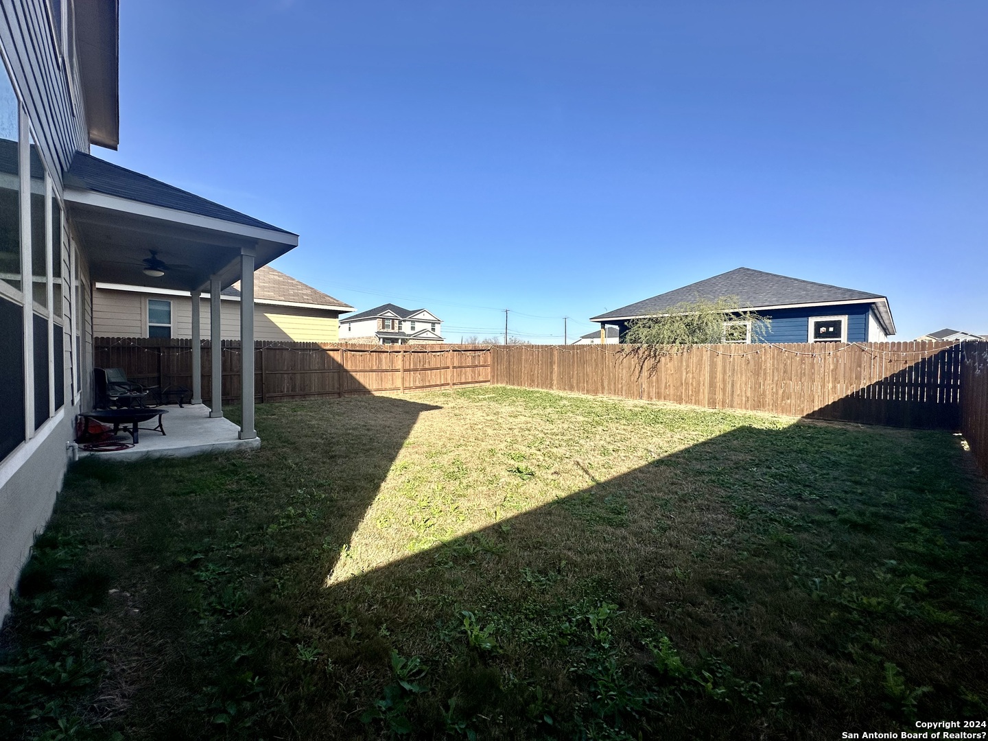8907 Portobello Converse, TX 78109 - Photo 26 of 26 a view of a backyard with a garden and plants
