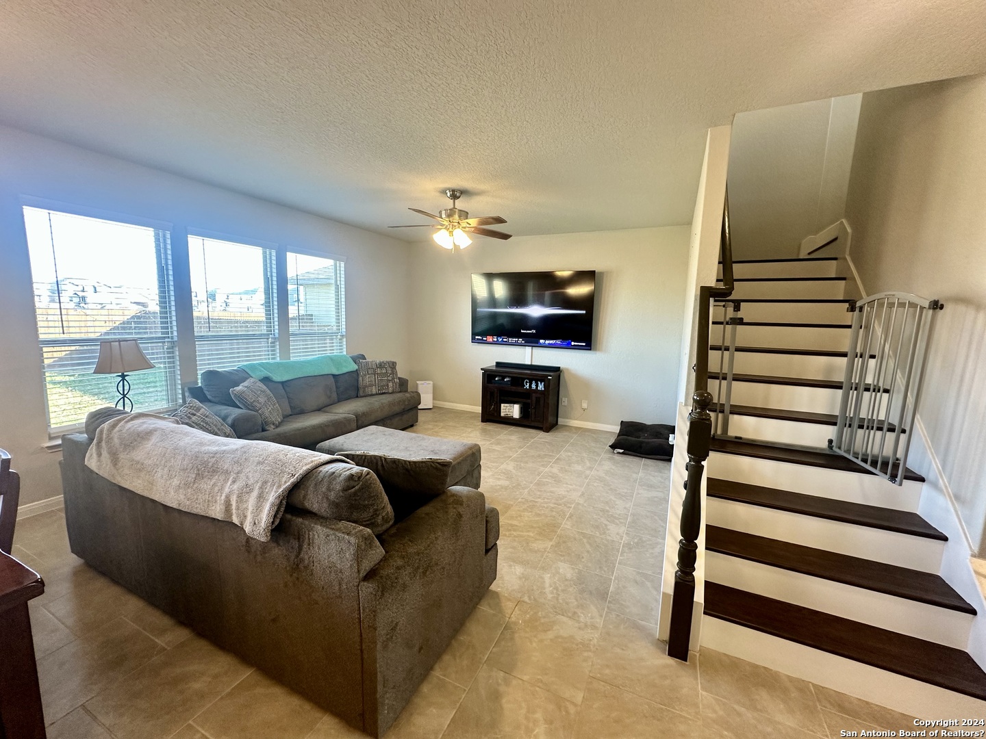 8907 Portobello Converse, TX 78109 - Photo 6 of 26 a living room with furniture and a fireplace