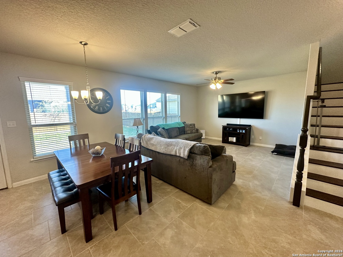 8907 Portobello Converse, TX 78109 - Photo 8 of 26 a living room with furniture and a flat screen tv