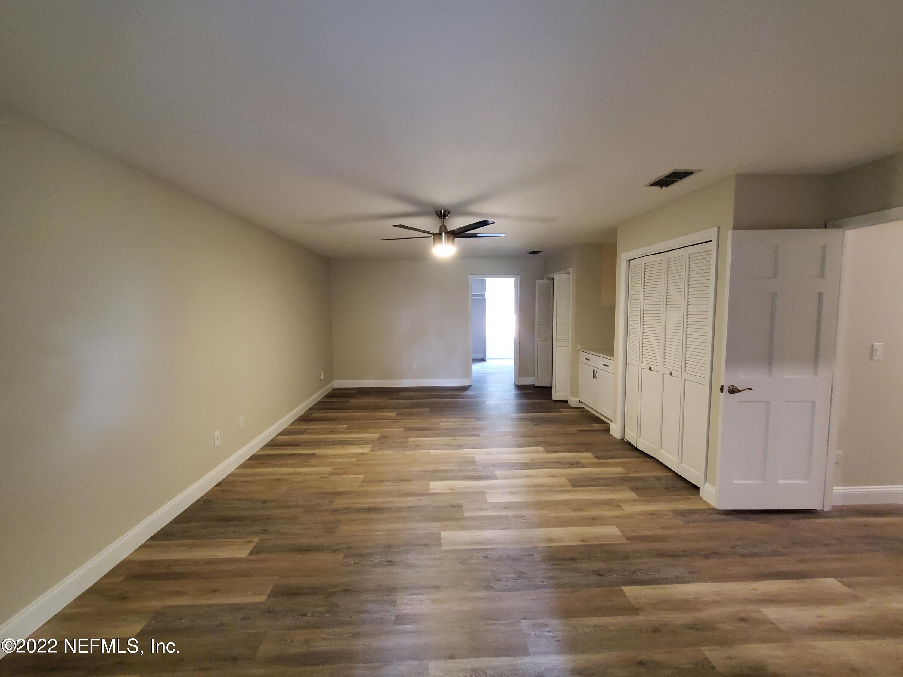 111 Nautilus Road St. Augustine, FL 32086 - Photo 20 of 35 a view of a hallway with wooden floor