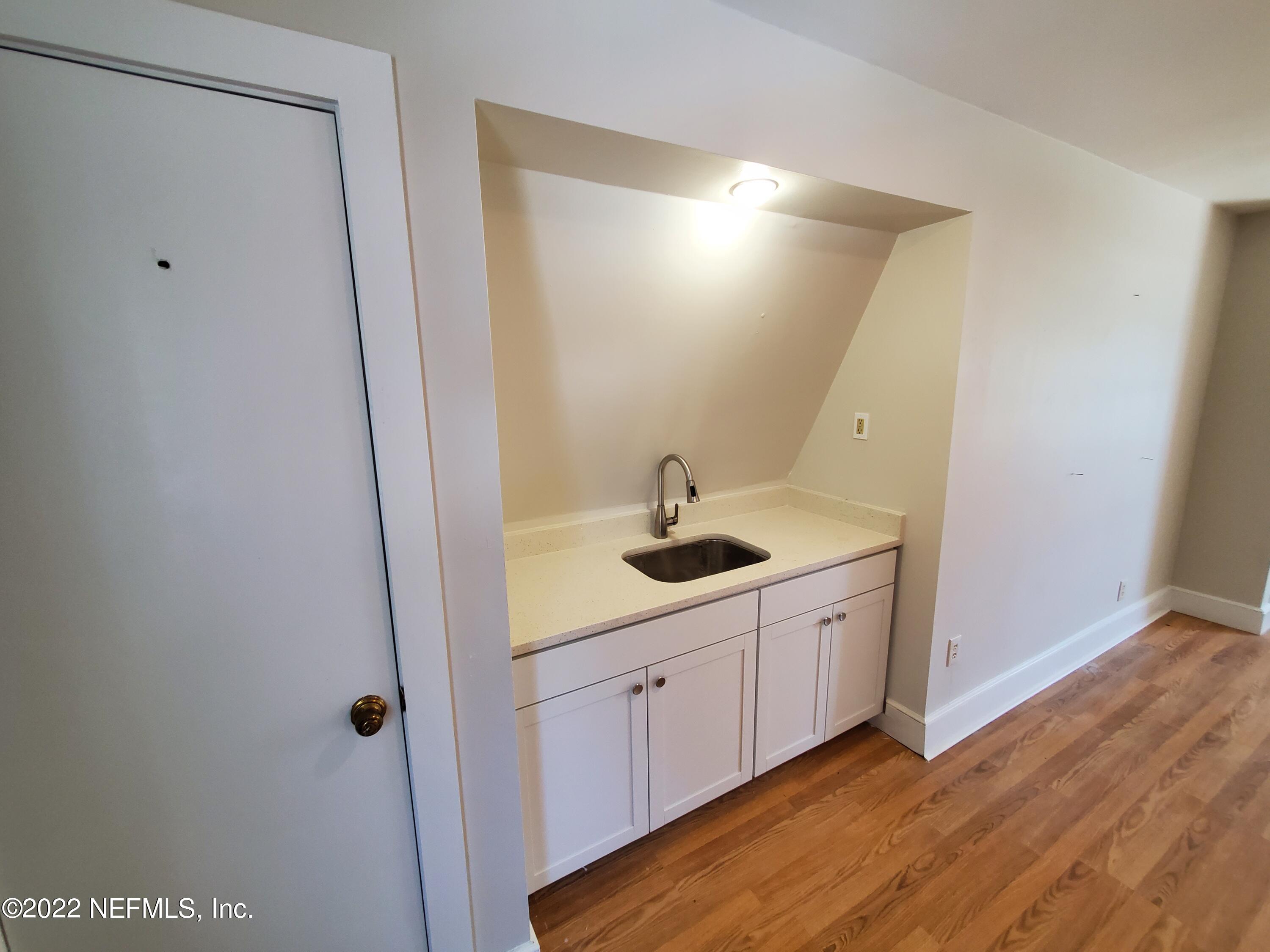 111 Nautilus Road St. Augustine, FL 32086 - Photo 32 of 35 a view of a bathroom with a sink and mirror