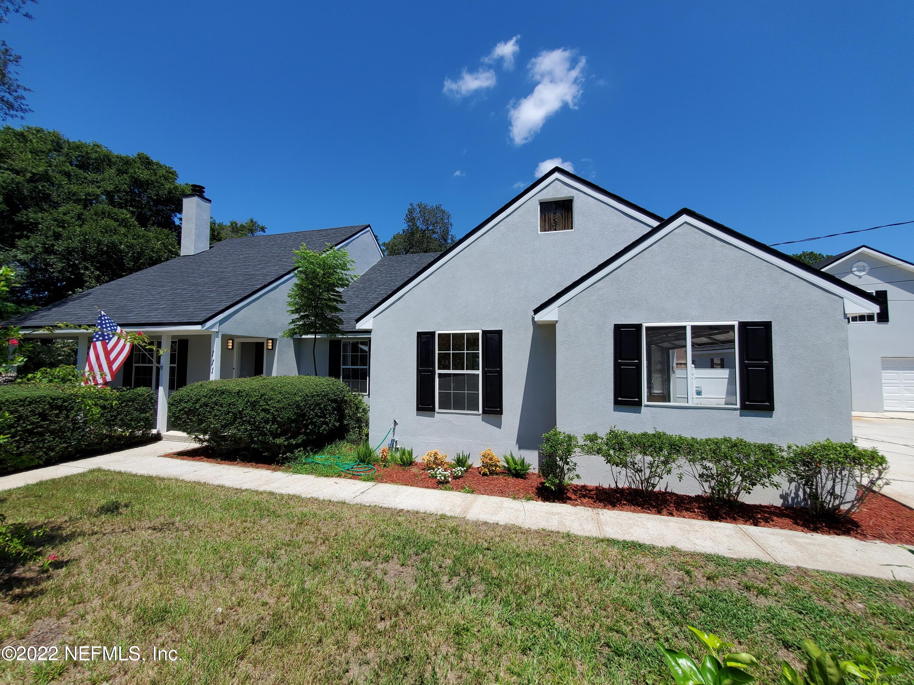 111 Nautilus Road St. Augustine, FL 32086 - Photo 4 of 35 a front view of a house with a yard