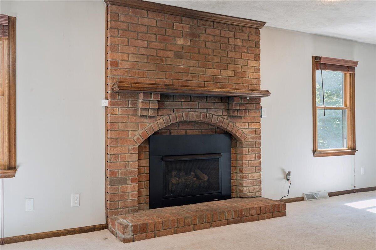 431 Langdon Road Evington, VA 24550 - Photo 7 of 54 a living room with a fireplace