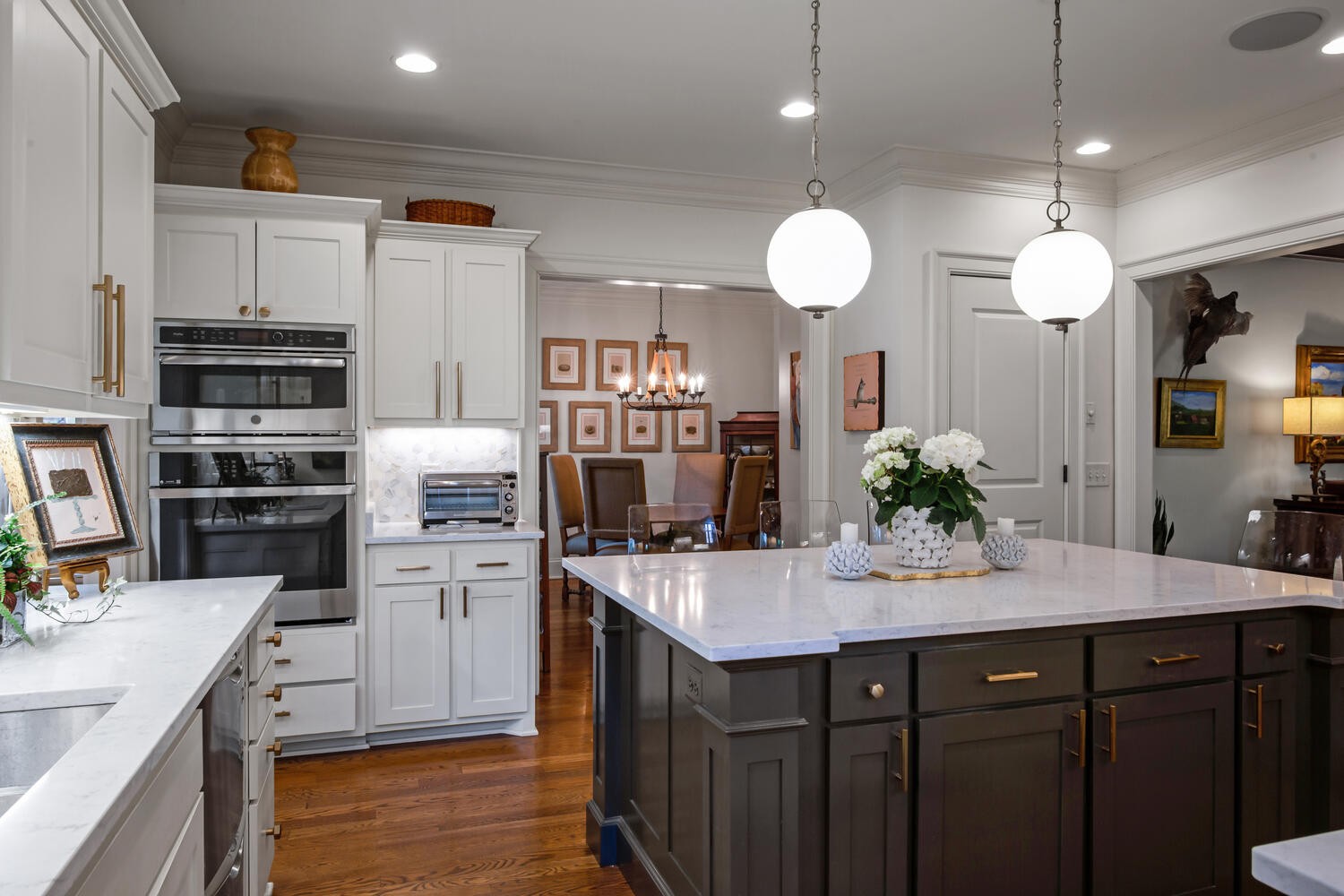 4018 Valley Road Nashville, TN 37205 - Photo 13 of 39 a kitchen with kitchen island white cabinets and stainless steel appliances