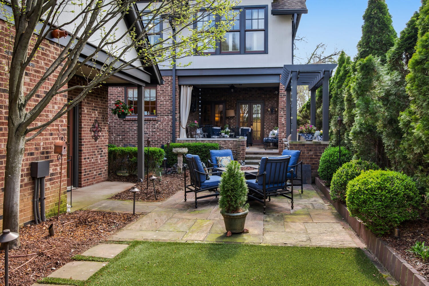 4018 Valley Road Nashville, TN 37205 - Photo 35 of 39 a view of a chair and table in backyard of the house