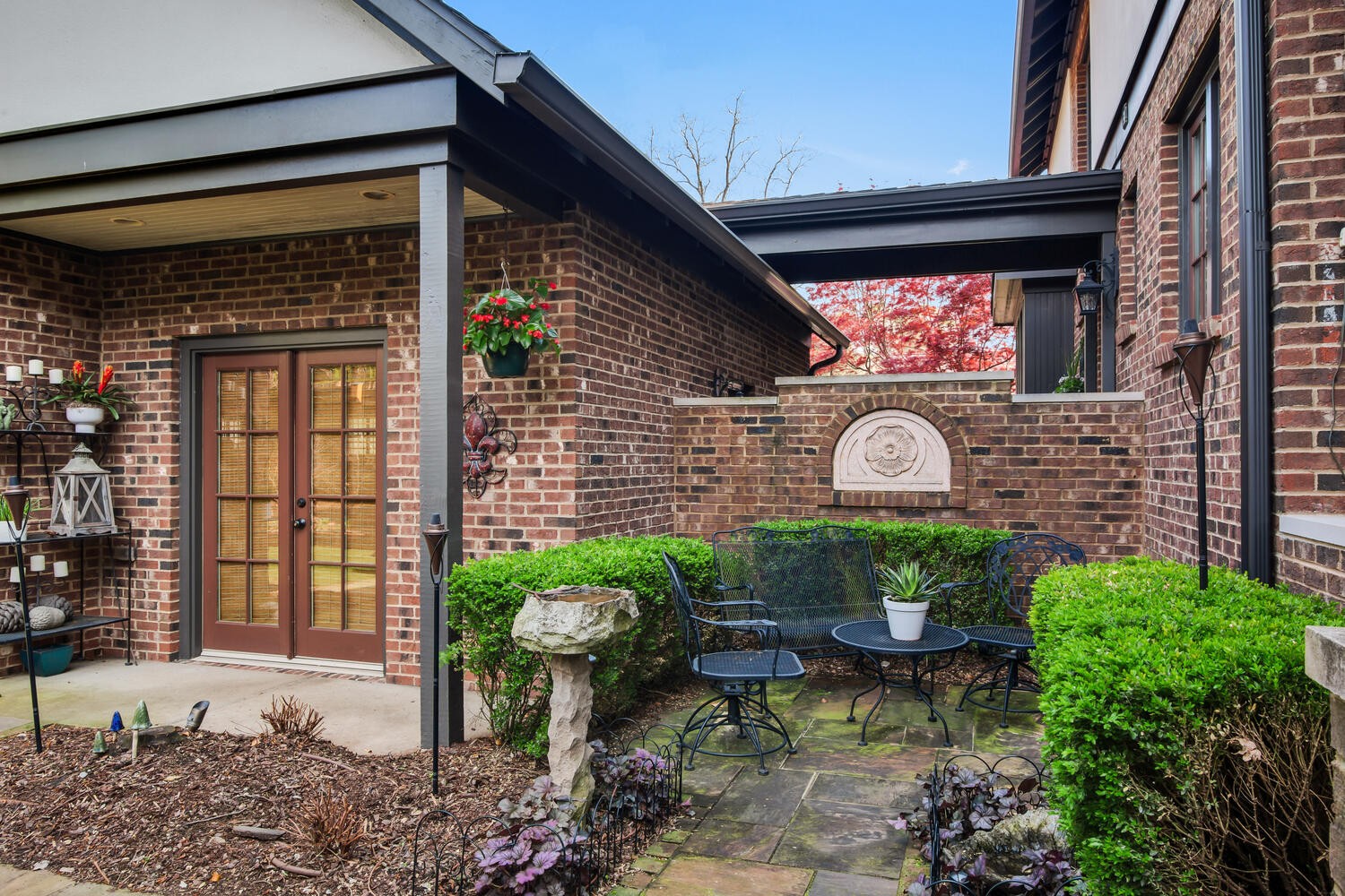 4018 Valley Road Nashville, TN 37205 - Photo 36 of 39 a front view of a house with garden and plants