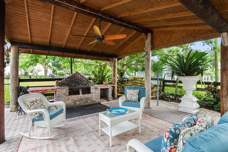 10782 58th Road South Lake Worth, FL 33449 - Photo 18 of 36 Outdoor sitting area with BBQ