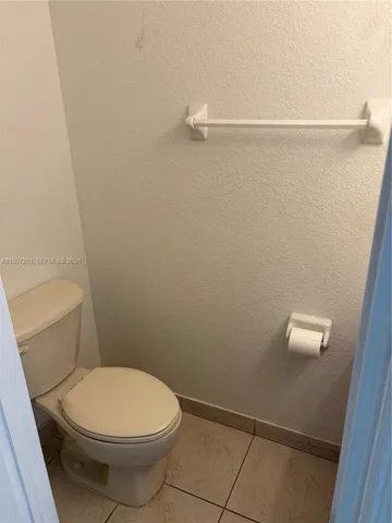 a bathroom with a toilet