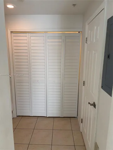 a view of a room with white walls