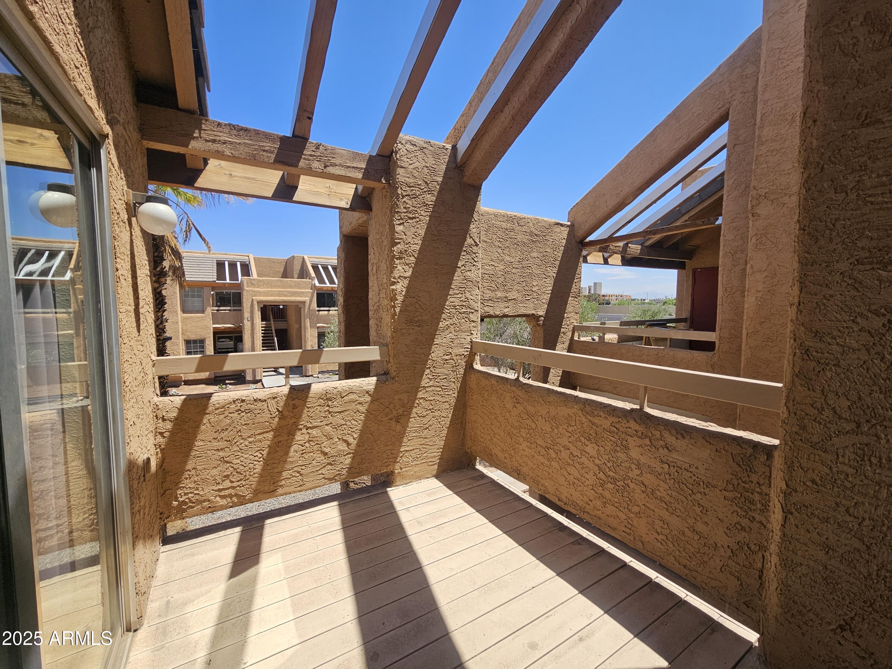 1370 South Price Road, Unit 101 Tempe, AZ 85281 - Photo 11 of 11 a view of balcony with furniture