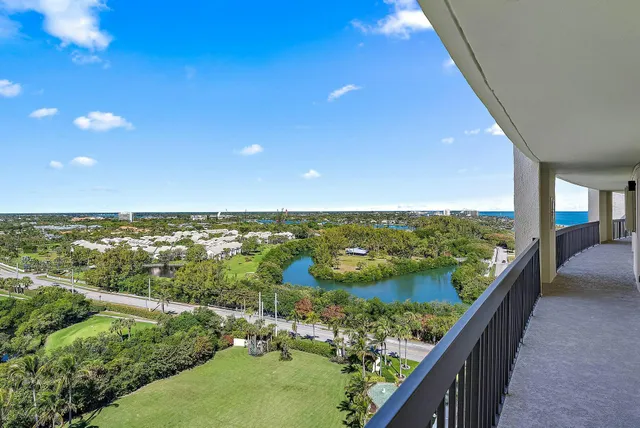 a view of a lake from a balcony