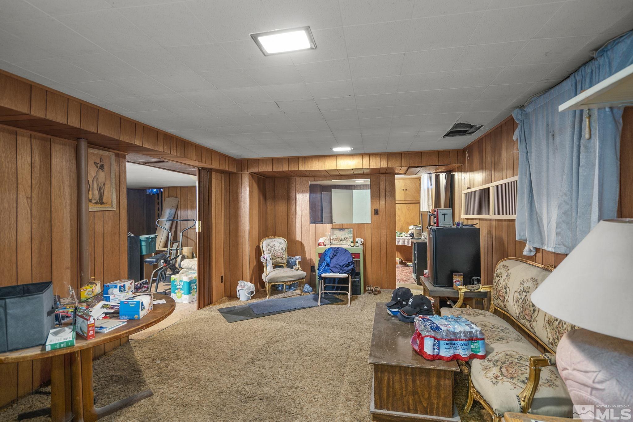 655 Belgrave Avenue Reno, NV 89502 - Photo 11 of 17 a living room with furniture and a window