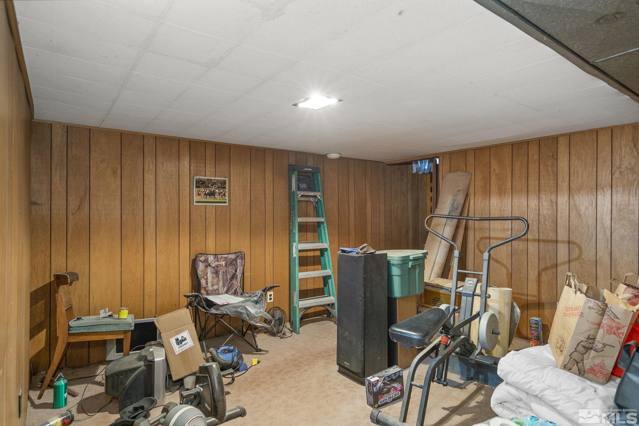655 Belgrave Avenue Reno, NV 89502 - Photo 13 of 17 a room with furniture and musical instruments