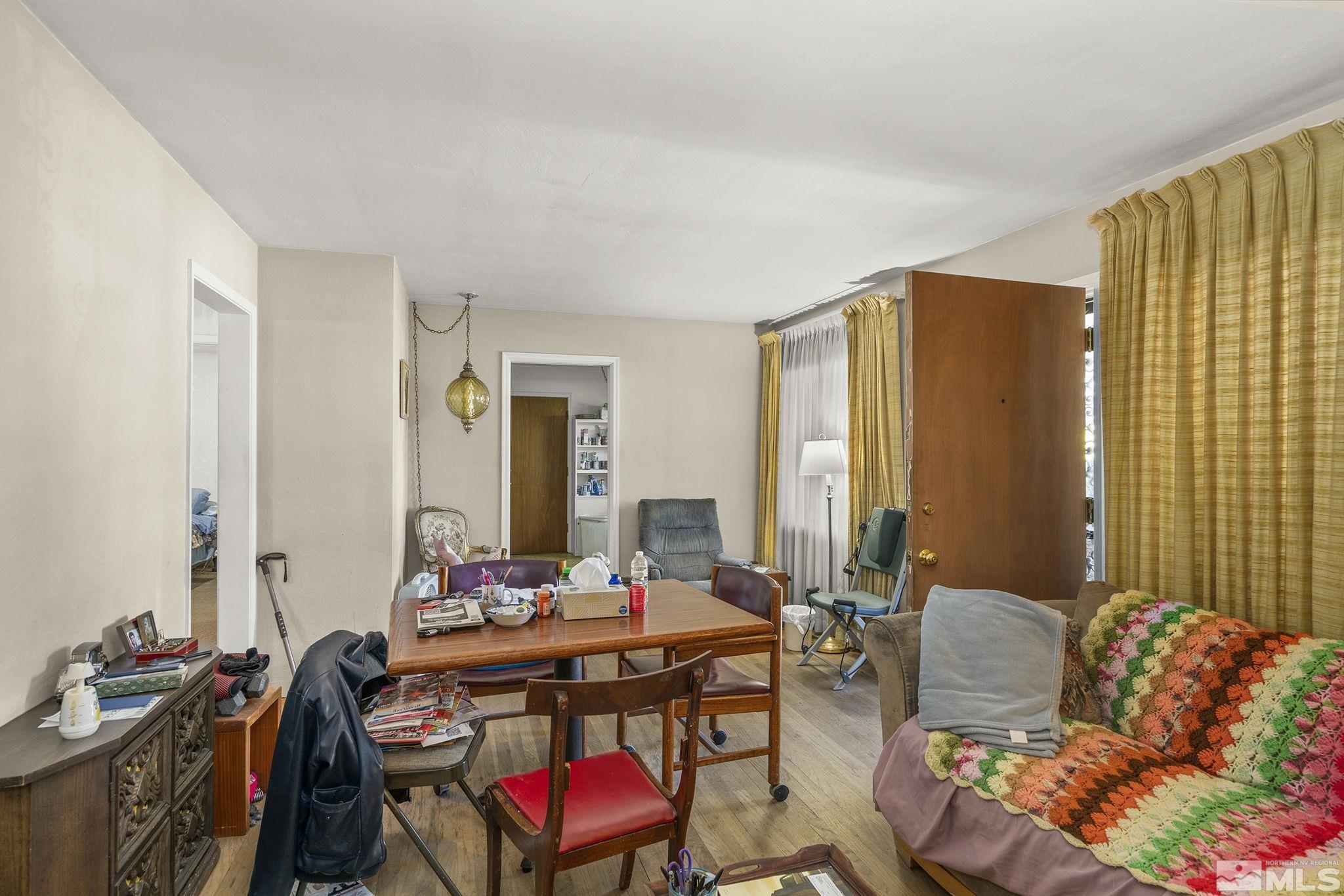 655 Belgrave Avenue Reno, NV 89502 - Photo 5 of 17 a living room with furniture and a window