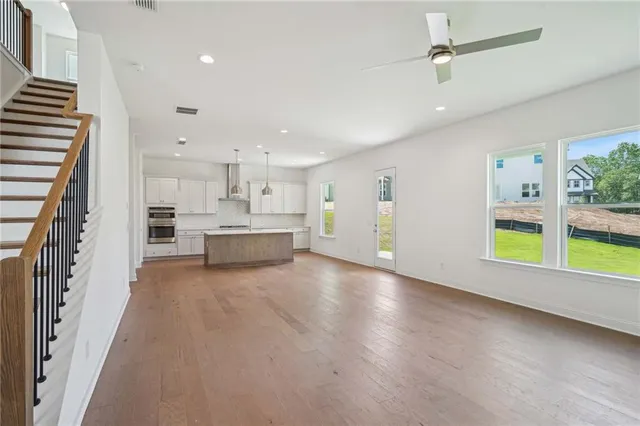 a view of a kitchen with furniture and a kitchen
