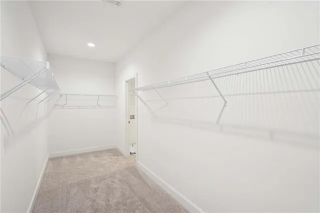 a view of a room with racks on the wall