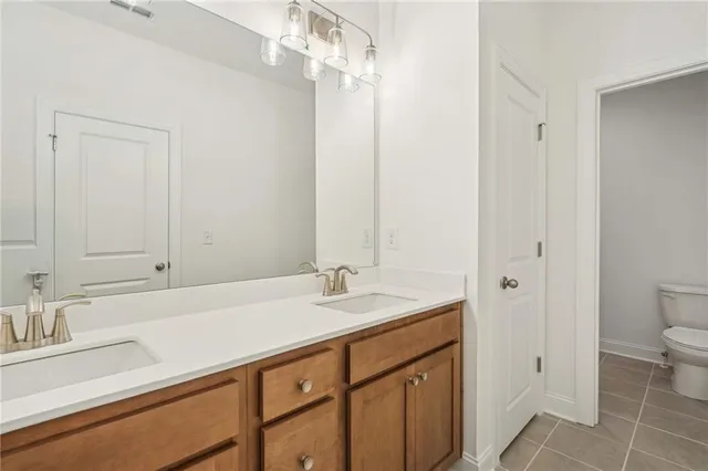 a view of a house with a yard and porch