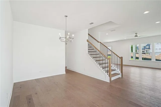 a view of a hallway with staircase