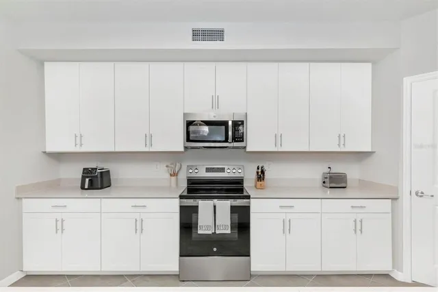 a room with chairs and stairs