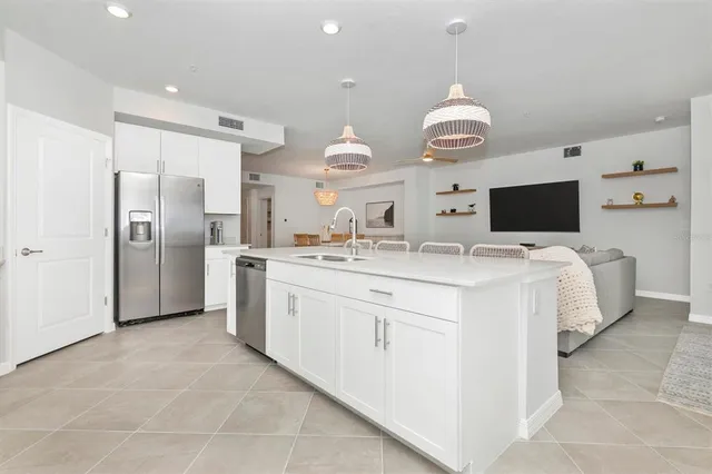 a backyard of a house with outdoor seating