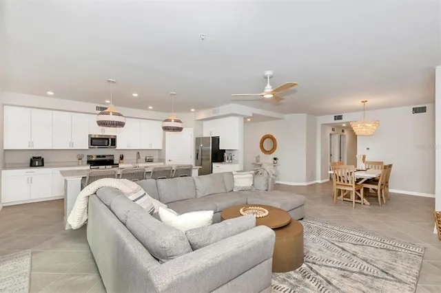 a bathroom with a double vanity sink mirror and shower