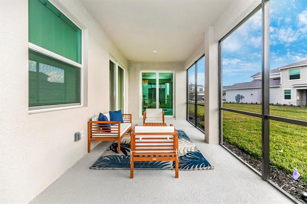 12625 Radiance Court, Unit 102 Venice, FL 34293 - Photo 25 of 99 a room with chairs and stairs