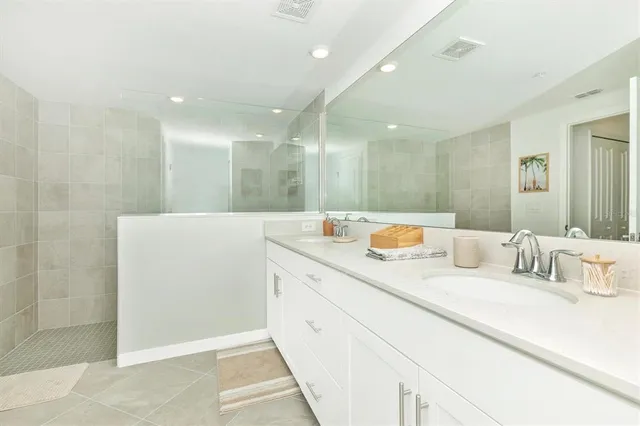 a swimming pool with trees in the background