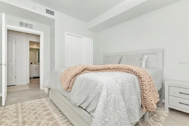 a view of a golf course with an ocean