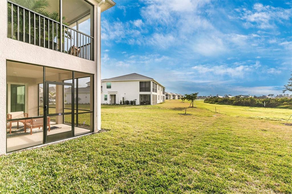 12625 Radiance Court, Unit 102 Venice, FL 34293 - Photo 50 of 99 a view of a house with a ocean view